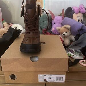 Insulated Ugg boots. Size 13C. Brand new never worn.